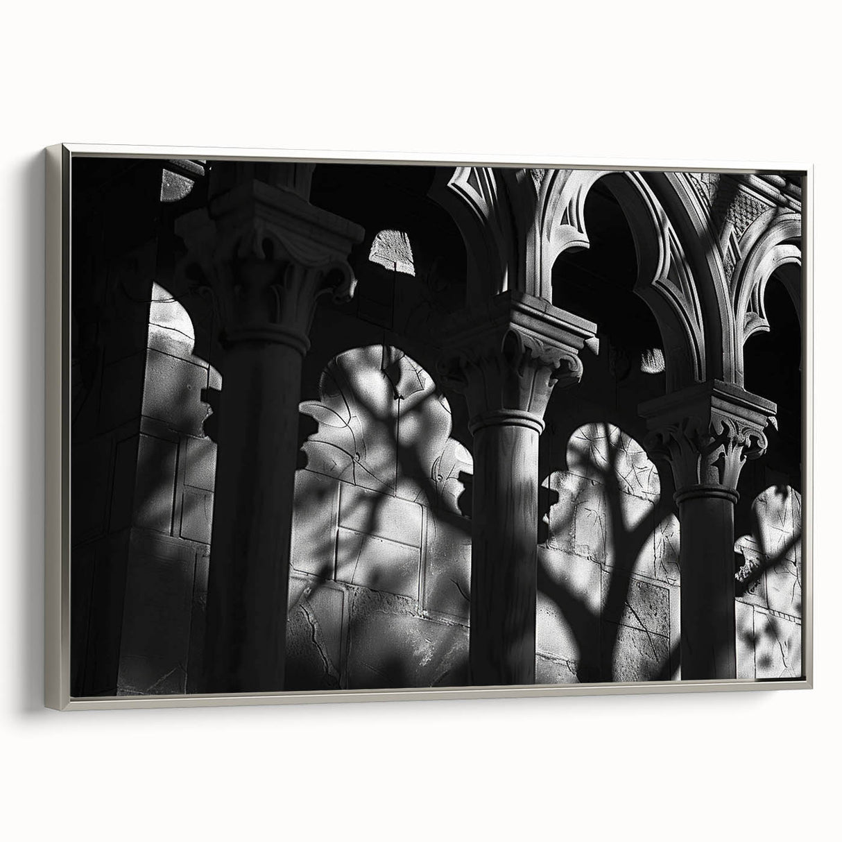 Framed canvas featuring a grayscale vintage poster of architectural columns.