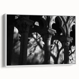 Extra large framed canvas of vintage poster art featuring architecture columns in black with colorful accents.