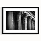 Extra large abstract art print featuring colorful, textured columns on a black framed canvas, ideal for living room decor.