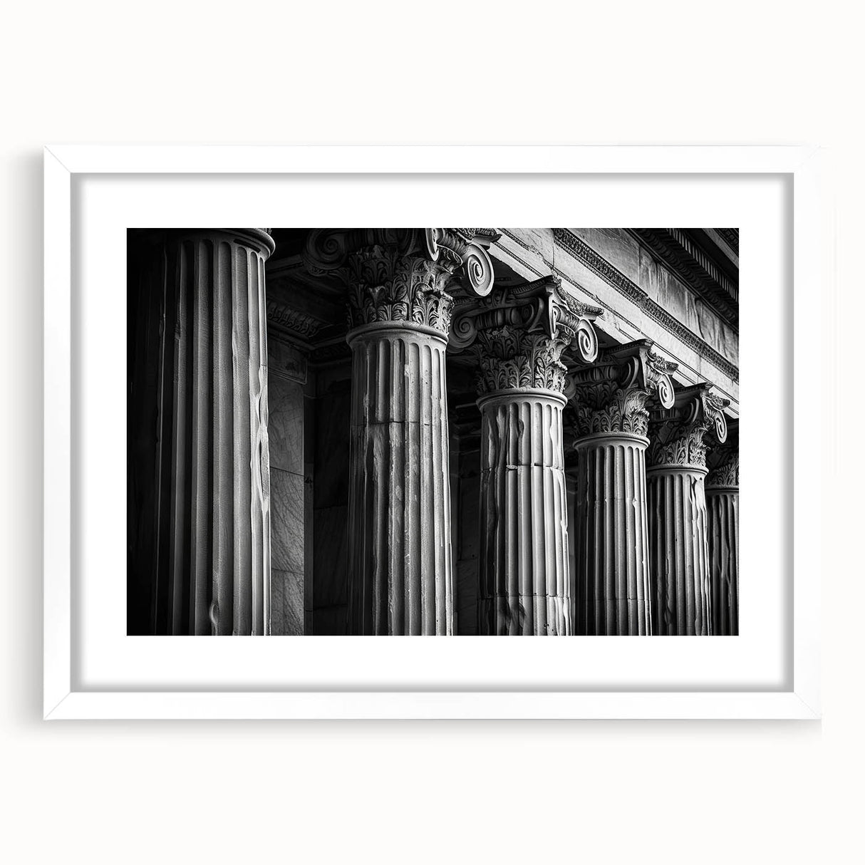 Abstract art print of white columns against a dark background, framed in white, suitable for dining room or bedroom decor.