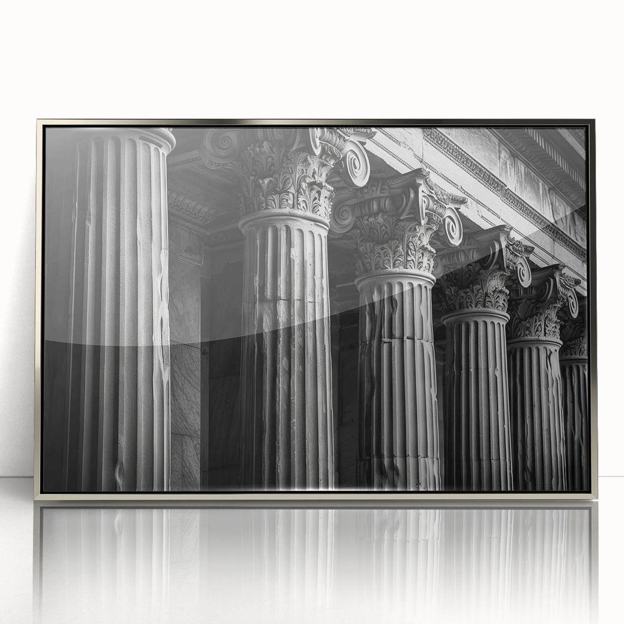 Mid-century modernist art featuring silver framed acrylic print of architectural columns in muted gray tones.