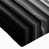 Black and white large art print of architectural columns on a stretched canvas, suitable for bedroom wall decor.