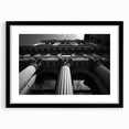 Extra large abstract art print featuring colorful, textured columns, in a black frame with mat, ideal for living room decor.