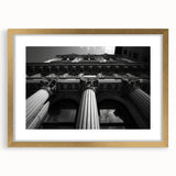 Extra large abstract art print depicting textured columns in muted gold and white tones, framed, ideal for living room decor.