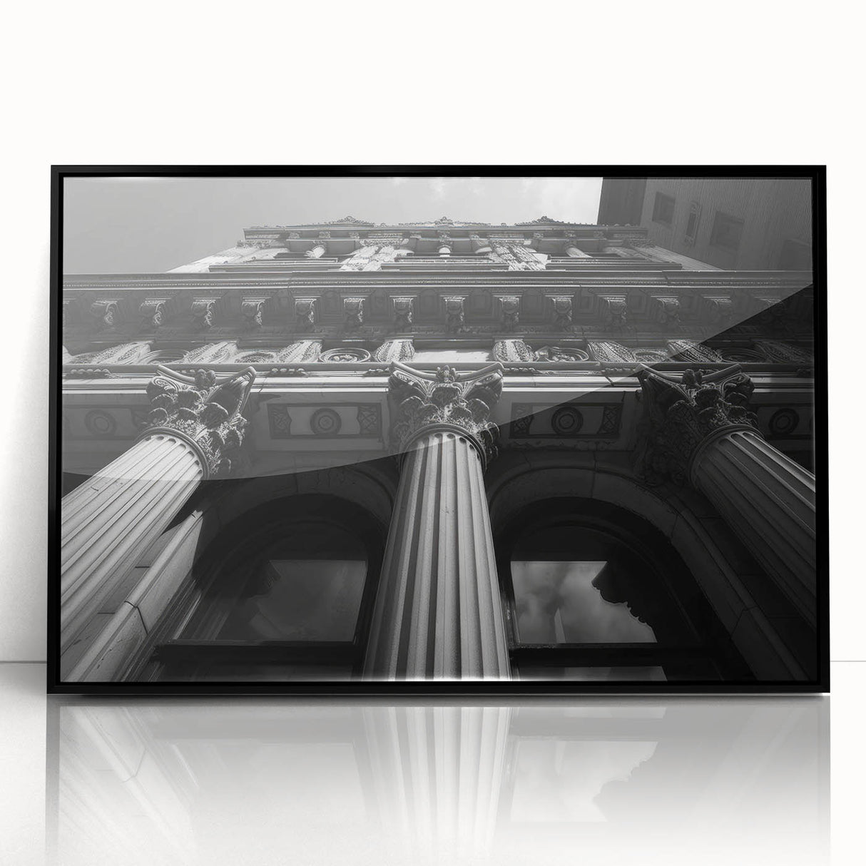 Large abstract wall art featuring black and white architectural columns in a mid-century modernist style.