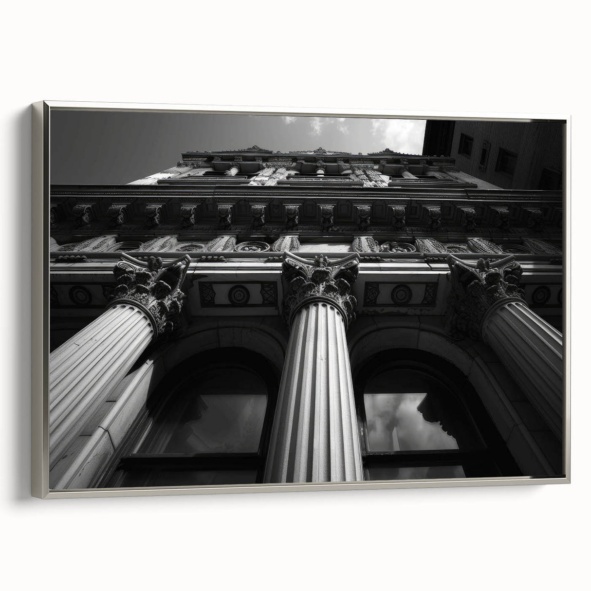 Framed canvas featuring a vintage poster of colorful landscape art with black architectural columns, ideal for office decor.