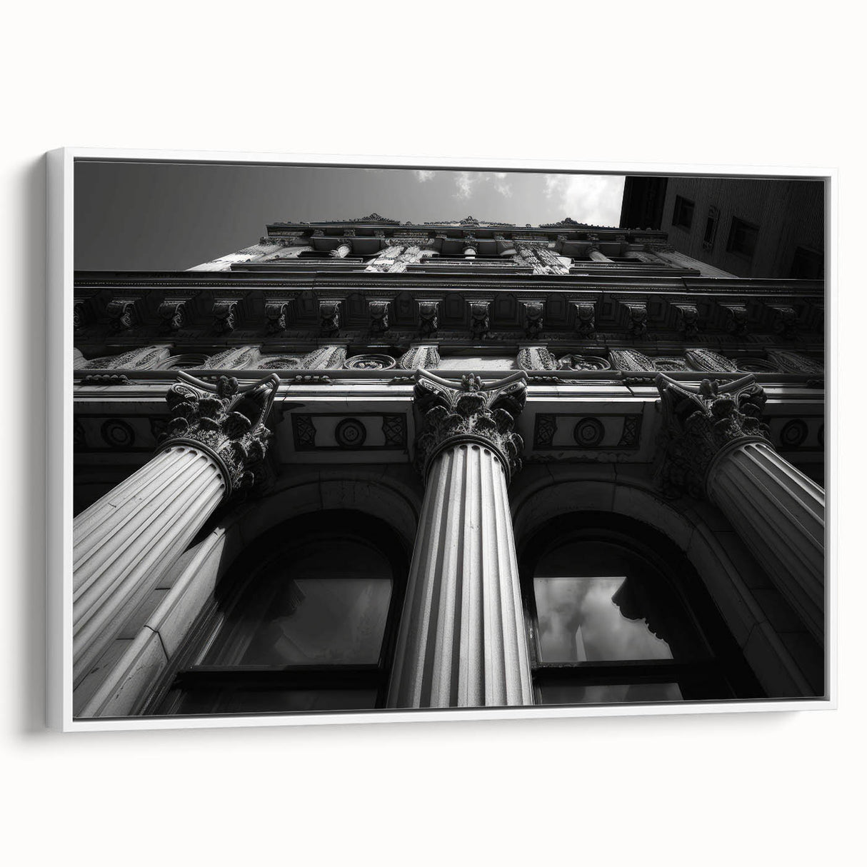 Vintage poster art of classical columns in black and white on a framed canvas, suitable for living room decor.
