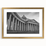 Extra large abstract art print featuring textured columns in muted gold tones on a framed canvas.