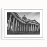 Textured abstract art print depicting layered columns in muted beige, ideal for bedroom wall art, framed with a white mat.