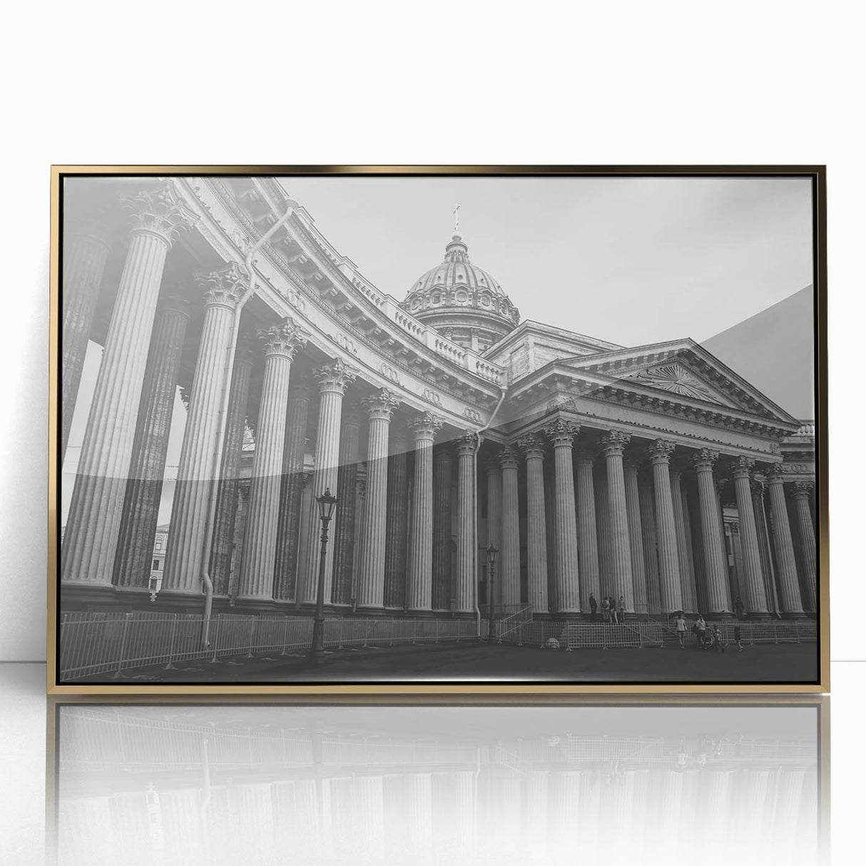 Large art print of a mid-century modernist column design in gold and white tones on a framed acrylic.