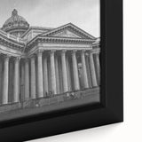 Close-up of black wall art featuring textured columns in vibrant colors on a framed canvas, ideal for living room decor.