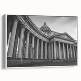 Vintage poster art featuring architectural columns in black and colorful accents on a large framed canvas.