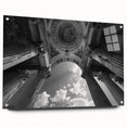 Large abstract wall art on acrylic glass featuring a geometric design of columns in muted gray.
