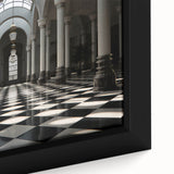 Close-up of black wall art featuring colorful, textured columns on a framed canvas, ideal for living room decor.