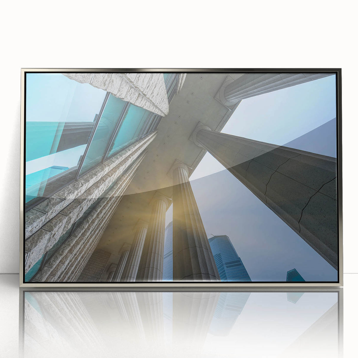 Mid-century modernist art featuring silver framed acrylic print of architectural columns, ideal for nursery wall decor.