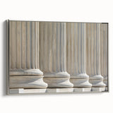 Framed canvas depicting a landscape with colorful, vintage-style columns, ideal for adding a classic touch to a living room.