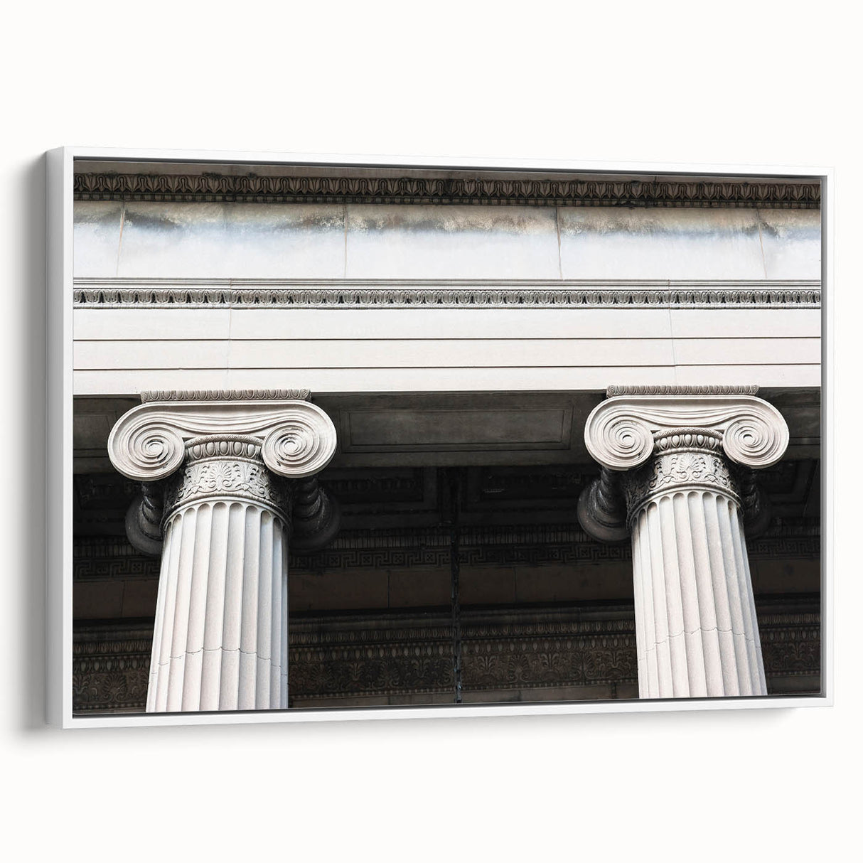 Vintage poster art of architectural columns in black and colorful accents on a framed canvas, ideal for living room decor.