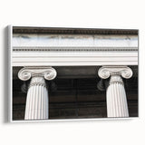 Vintage poster art of architectural columns in black and colorful accents on a framed canvas, ideal for living room decor.