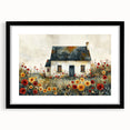 Extra large abstract art print featuring textured, colorful art of cottages, in a black frame with mat.