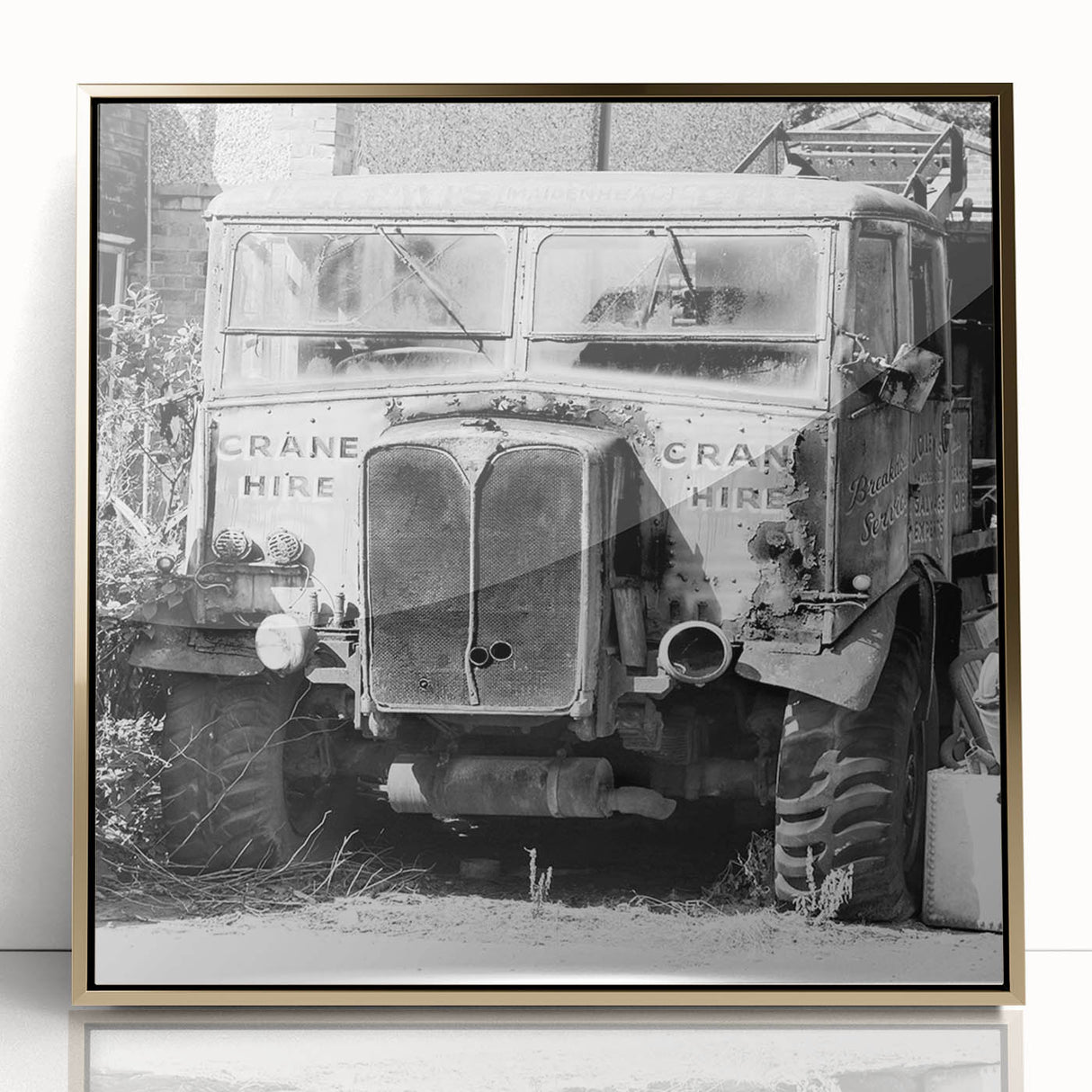 Large art print of a derelict building in muted gold and gray tones, framed acrylic, ideal for modern art wall decor.