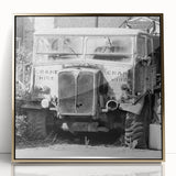 Large art print of a derelict building in muted gold and gray tones, framed acrylic, ideal for modern art wall decor.