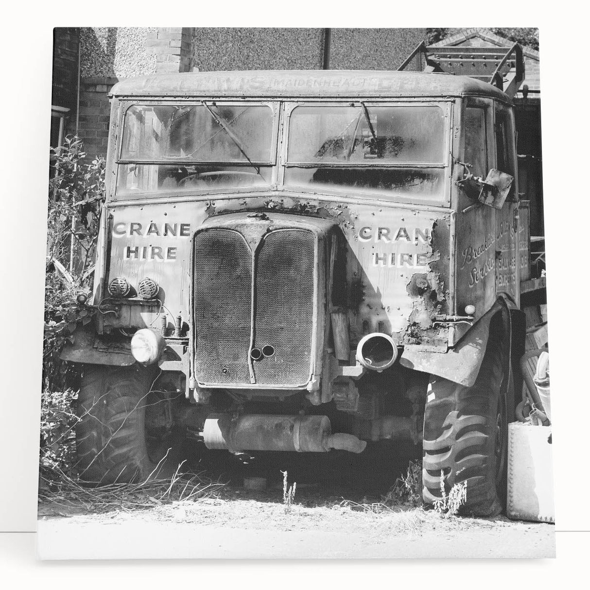 Large black and white photo of a dilapidated building on stretched canvas, suitable for kitchen wall art.