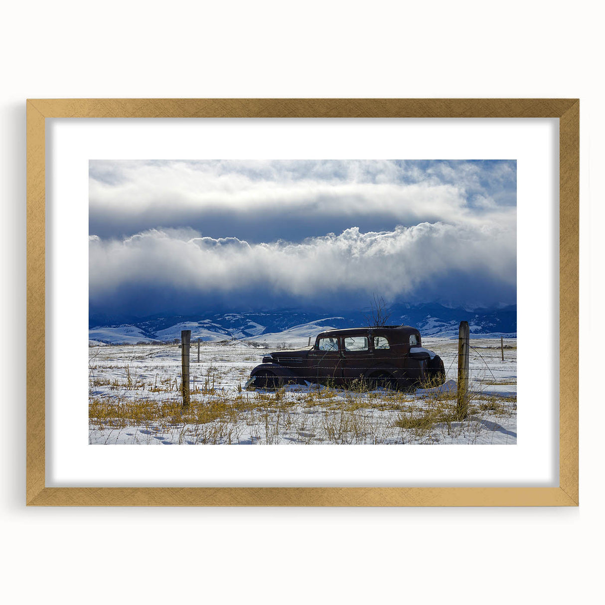 Extra large abstract art print featuring textured patterns in muted earth tones, framed in gold, ideal for living room decor.