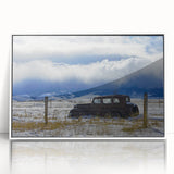 Art deco poster of a derelict building, rendered in muted gray tones, framed in white acrylic.