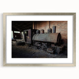 Textured abstract art print in muted earth tones on a framed canvas, suitable for bedroom decor.