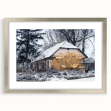 Textured abstract art print in muted grays and blues, framed in silver, ideal for bedroom decor.