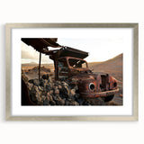 Textured abstract art print in muted gray and blue tones, framed with a silver mat, ideal for modern bedroom ambiance.