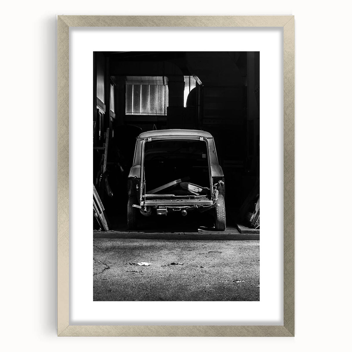 Textured abstract art print featuring a mix of gray and silver tones on a framed canvas, suitable for bedroom decor.