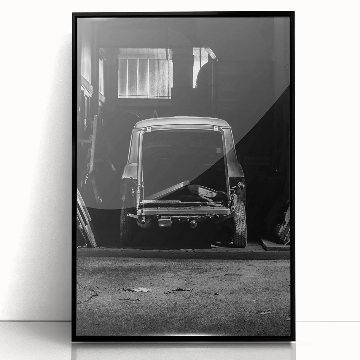 Large abstract wall art featuring mid-century modernist design in neutral and black tones, acrylic print framed in black.