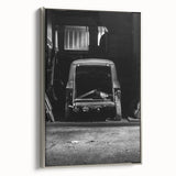 Framed canvas featuring a vintage landscape painting with a monochrome black background and vibrant colorful accents.