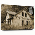 Large abstract wall art on acrylic glass depicting a derelict building, in muted gray tones.