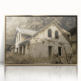 Large art print of a mid-century modernist building in muted gray and gold tones on framed acrylic.