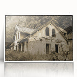 Art Deco poster of a dilapidated building, in muted gray and white tones, acrylic print framed in white.