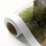 Art deco poster featuring a geometric pattern in muted gold and navy tones on rolled canvas, suitable for dining room decor.