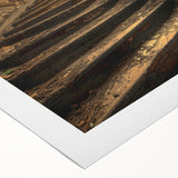 Art deco poster featuring geometric patterns in muted gold and black on rolled canvas, suitable for dining room decor.