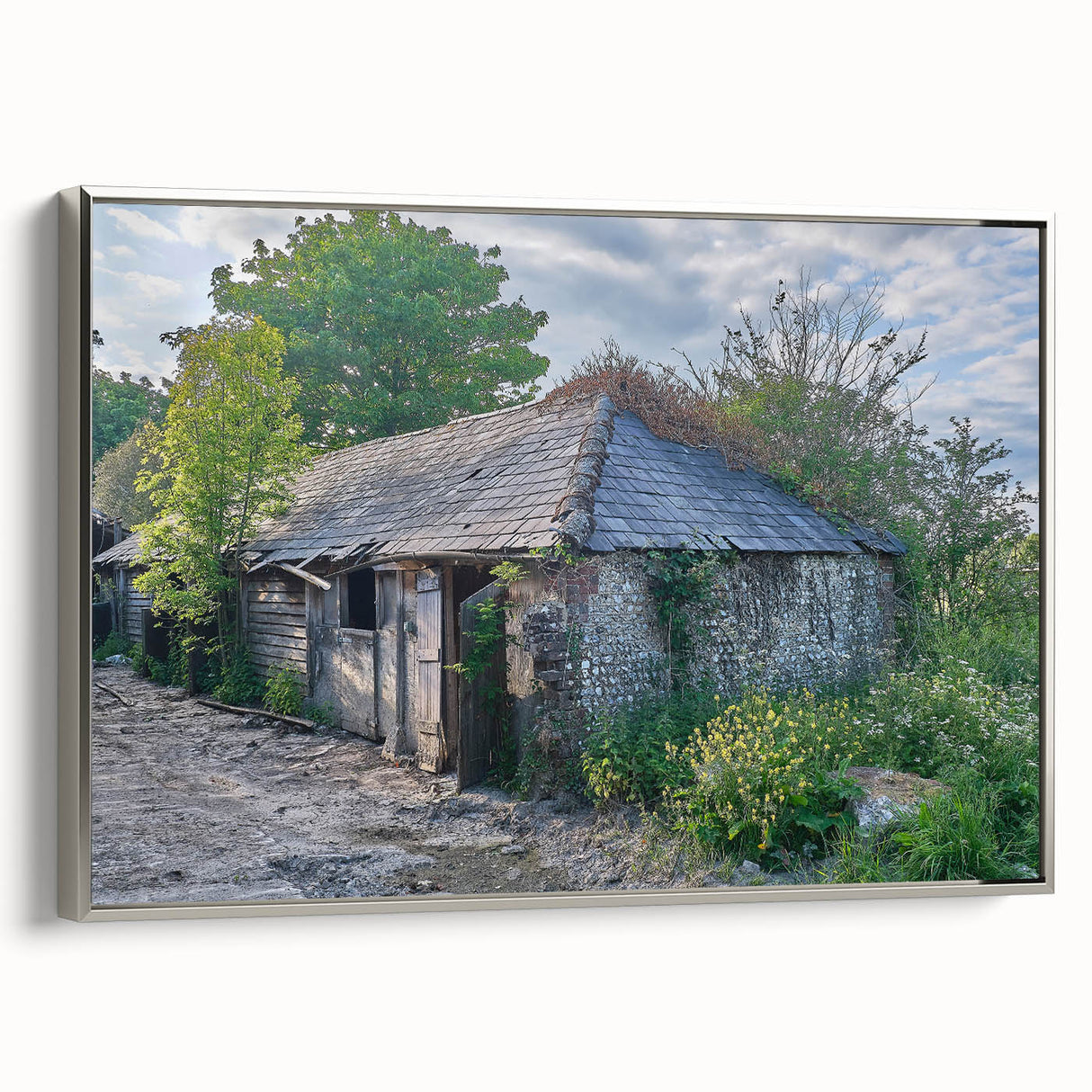 Vintage poster art featuring a silver-framed canvas with a black and colorful abstract design.