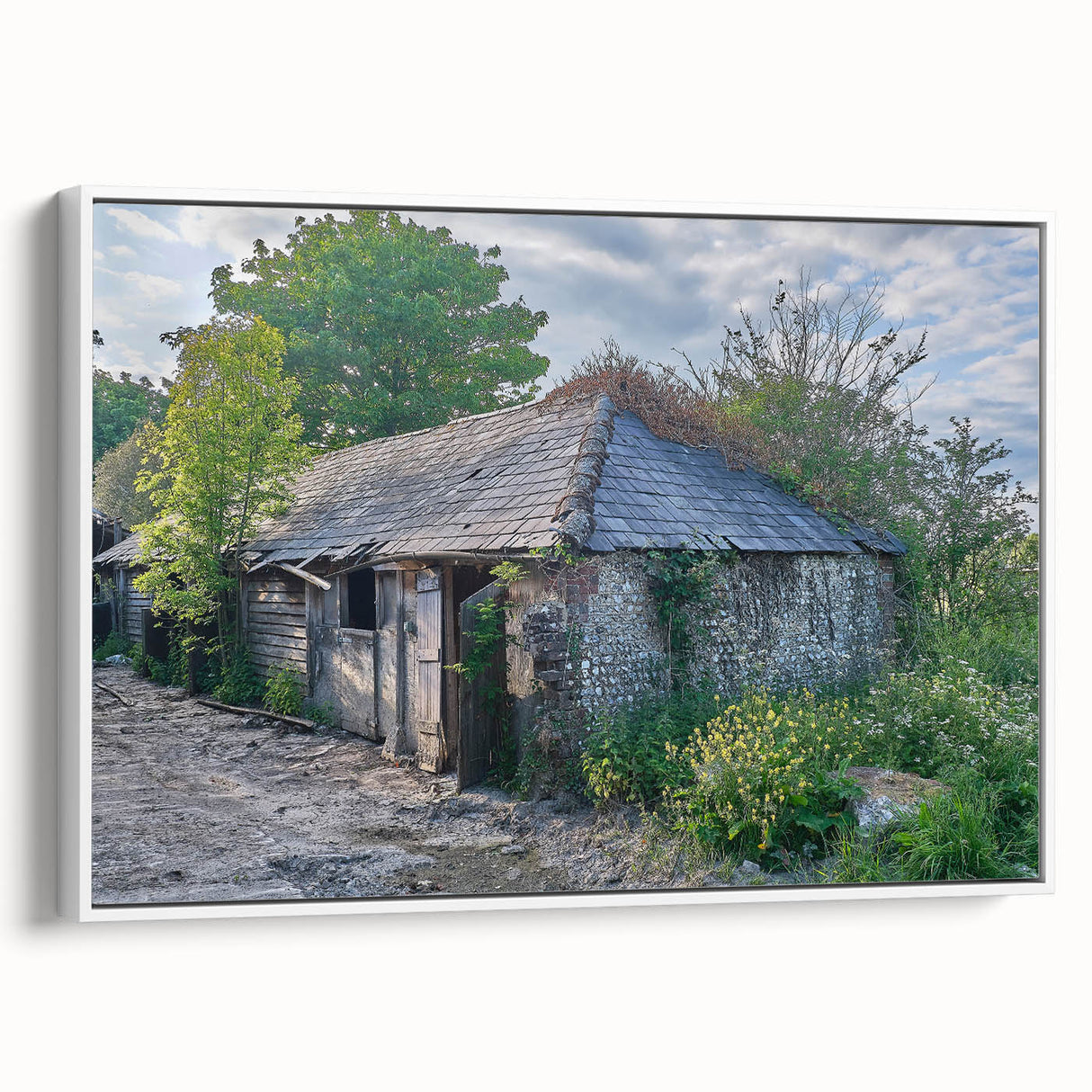 Extra large framed canvas featuring a textured depiction of a derelict building in black with colorful accents.