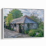 Extra large framed canvas featuring a textured depiction of a derelict building in black with colorful accents.