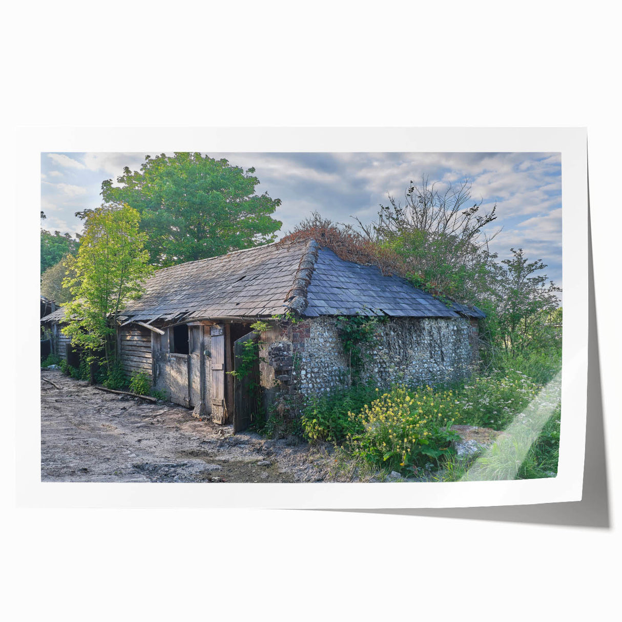 Rolled print of a derelict building in muted gray and blue tones, suitable as art wall for dining room.