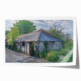 Rolled print of a derelict building in muted gray and blue tones, suitable as art wall for dining room.