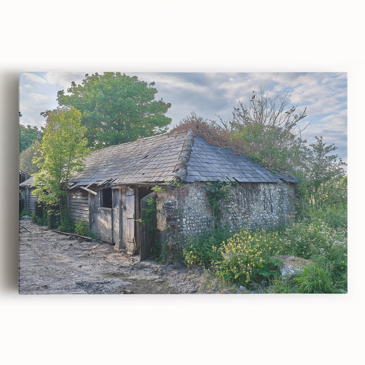 Black and white photo of a derelict building on stretched canvas, ideal for kitchen art.