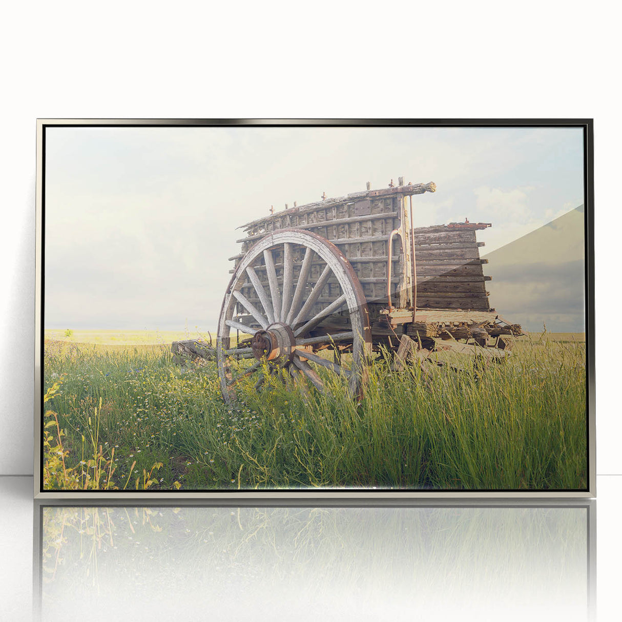 Mid-century modernist art depicting a derelict building, in muted gray tones, framed in silver acrylic.