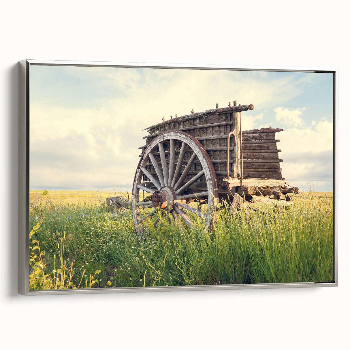 Framed canvas of a vintage-style landscape painting depicting a colorful, abandoned building.