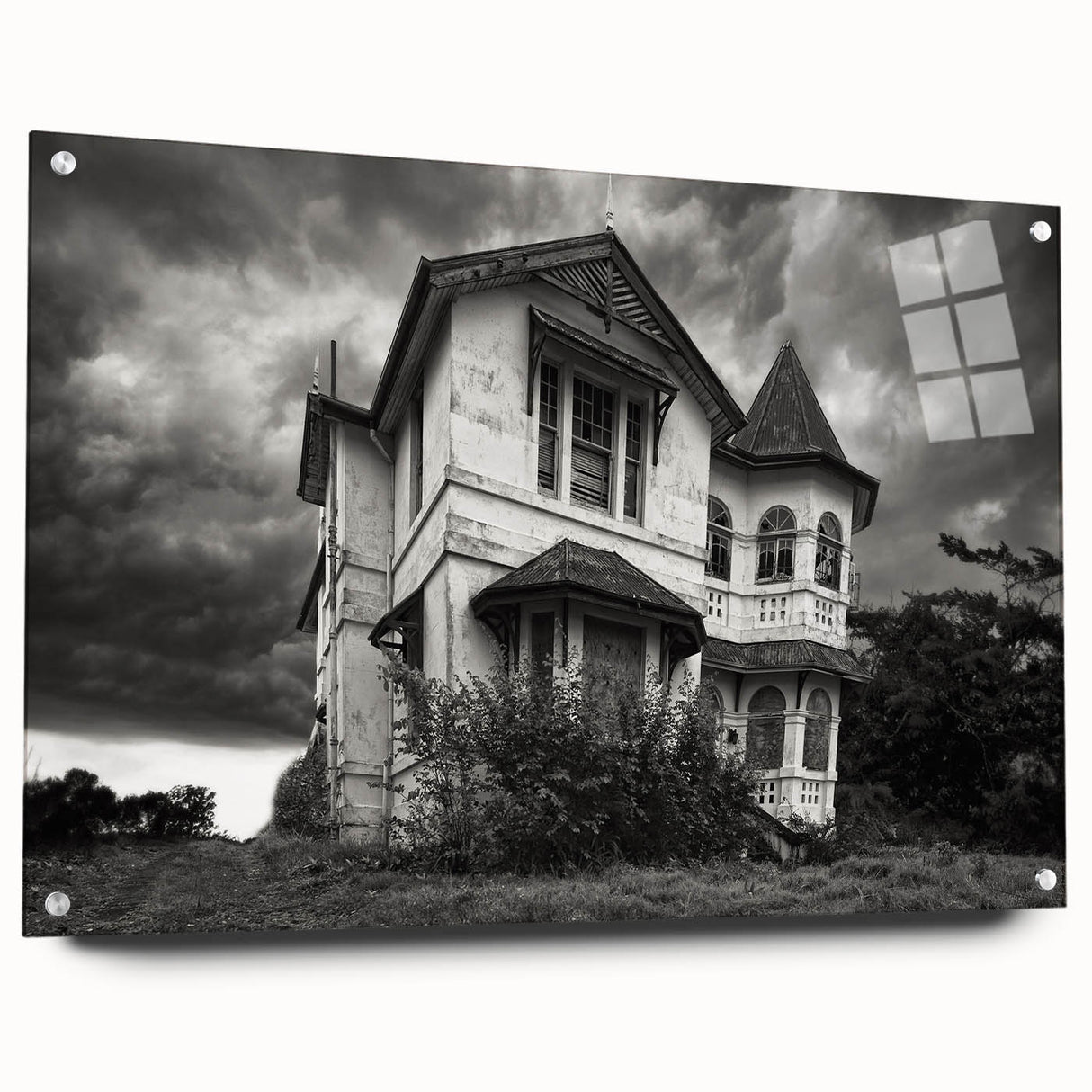 Large abstract wall art on acrylic glass depicting a derelict building in muted gray and blue tones.