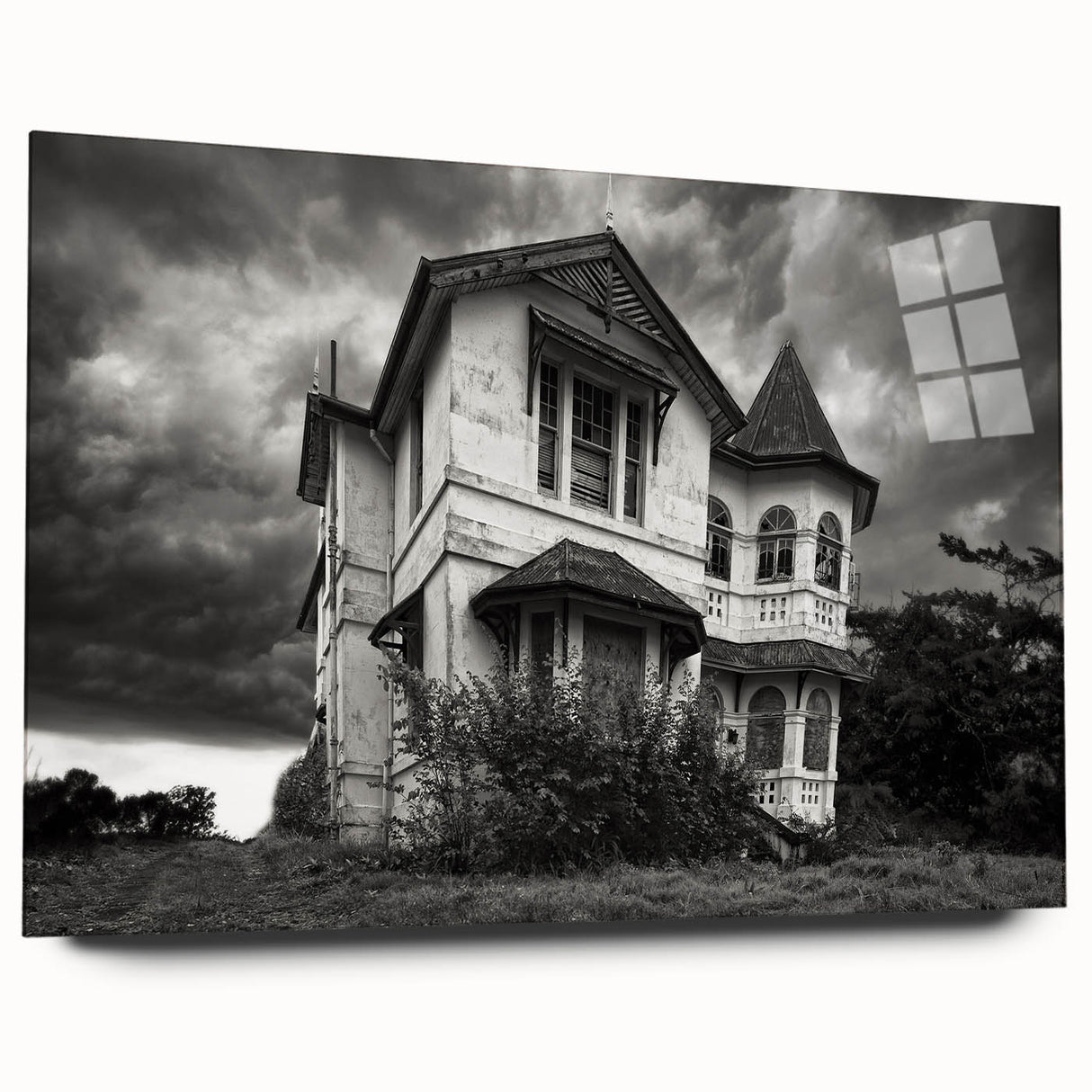 Large abstract wall art on acrylic glass depicting a derelict building, in muted grays.