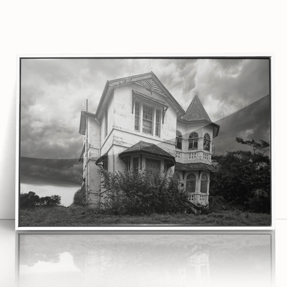 Art deco poster of a derelict building in muted gray and white tones, acrylic print framed in white.